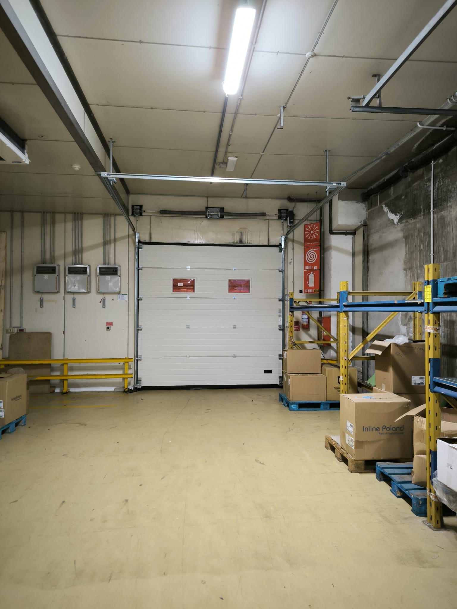 portoni sezionali industriali - apertura verticale